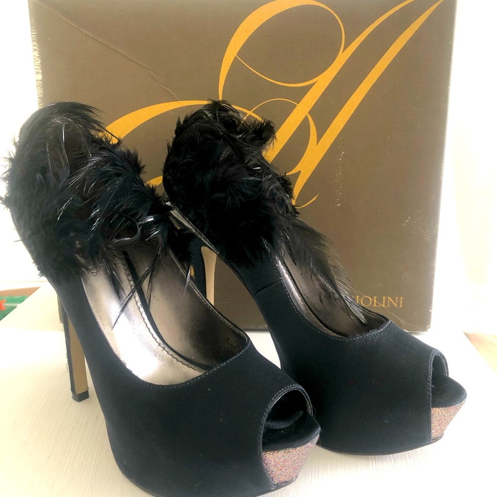 My favorite shoes ever. Almost new. Satin w/ Black feathers.